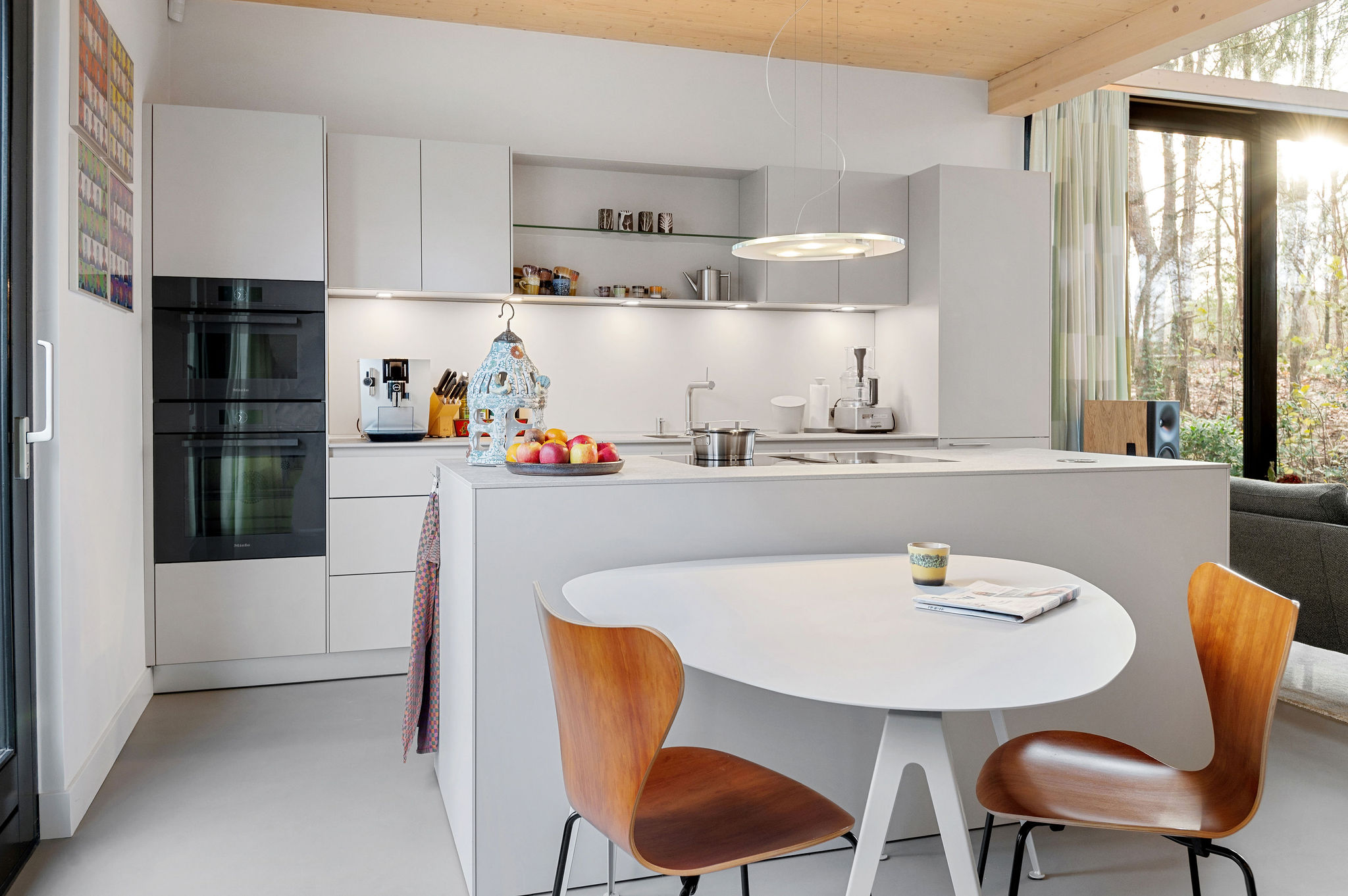 unieke keuken in kiezel met Dekton Pietra en Extendo tafel, foto 3